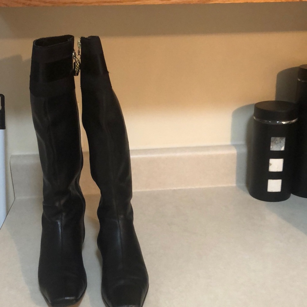 Authentic Gucci black medium media heeled boots.